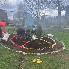 Students working on a fresh new garden at their school